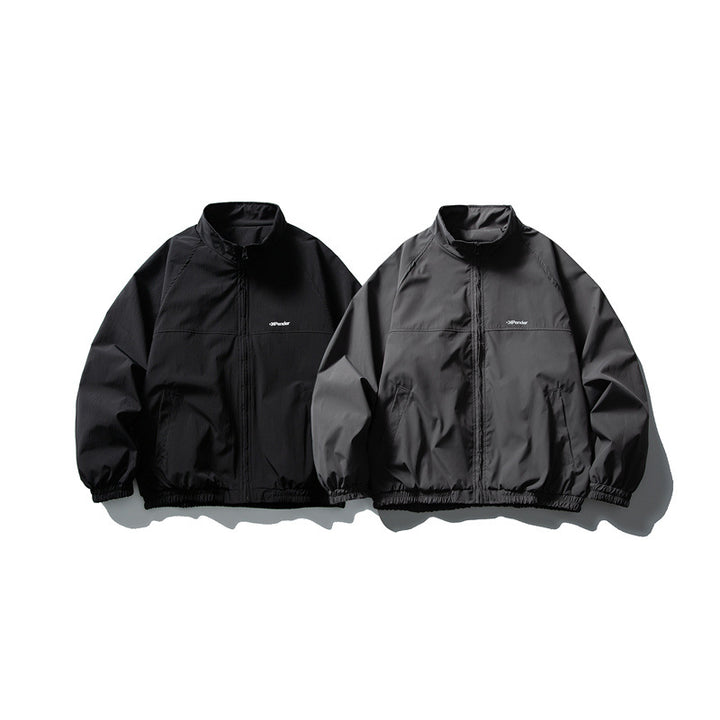 Unisex Lightweight water-repellent windbreaker with stand-up collar, raglan sleeves, and elastic hem Mune Fashion