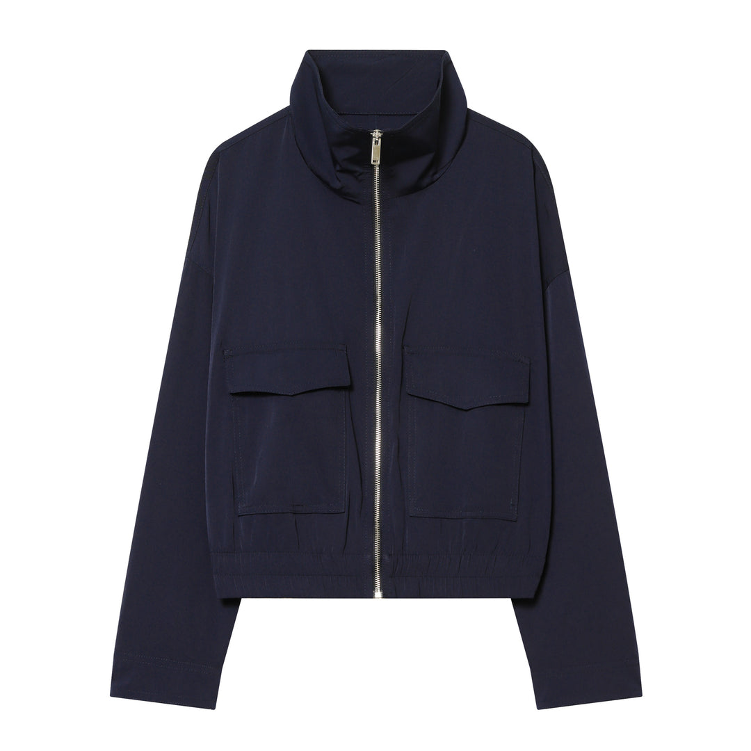 Women's short utility blouson jacket with standing collar, patch chest pockets, full zip, and elastic hem Mune Fashion