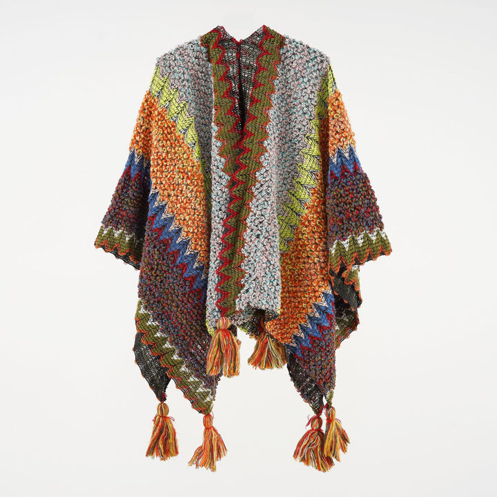 Women's structured bouclé knit poncho with jacquard pattern and tassels Mune Fashion
