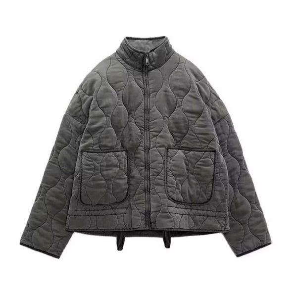 Unisex quilted jacket with stand-up collar, front pockets, and drawstring Mune Fashion