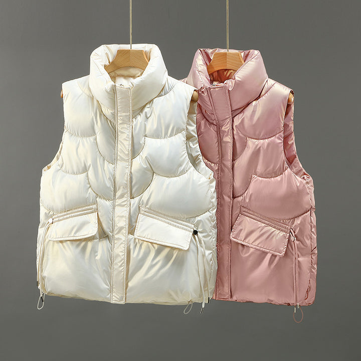 Women's quilted gilet with high stand-up collar, padded, two flap pockets and adjustable hem Mune Fashion