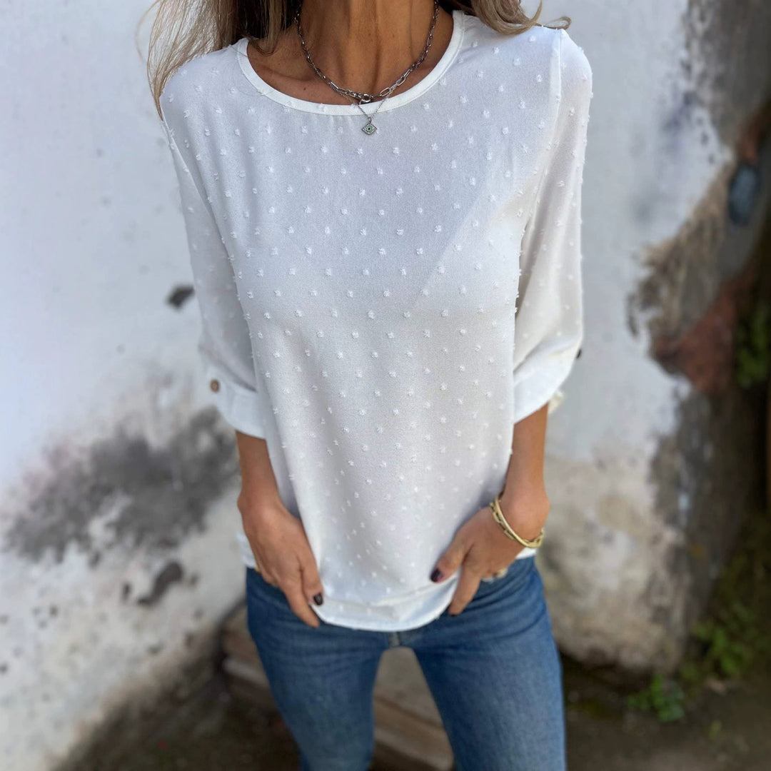 Ladies blouse with textured dot pattern and three-quarter sleeves Mune Fashion
