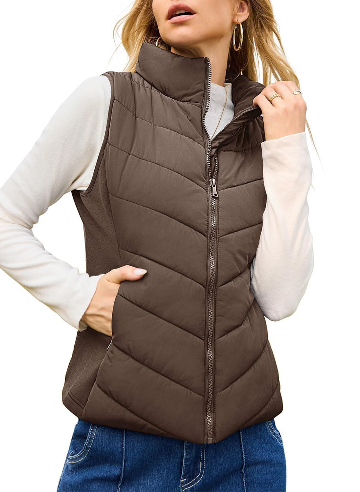 Women's quilted thermo vest with high stand-up collar and elastic side inserts Mune Fashion