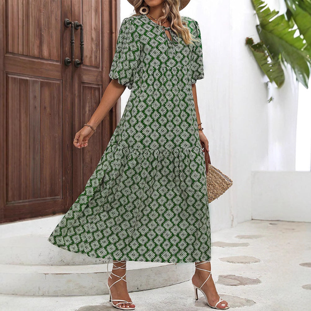 Women’s airy maxi dress with geometric ethnic print, gathered tiered skirt and keyhole neckline Mune Fashion