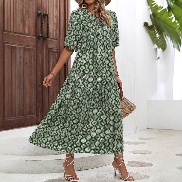 Women’s airy maxi dress with geometric ethnic print, gathered tiered skirt and keyhole neckline Mune Fashion