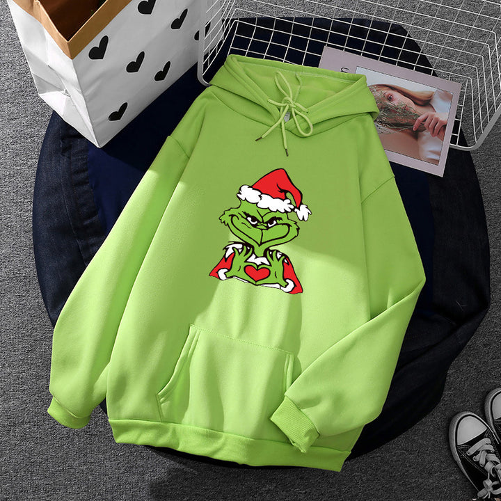 Unisex hoodie with soft fleece lining, kangaroo pocket and eye-catching Christmas comic print Mune Fashion