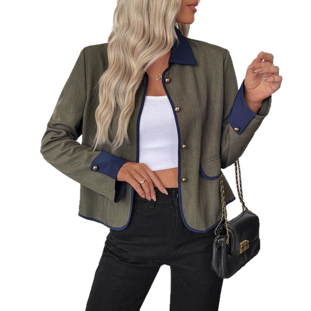 Ladies short blazer with contrasting piping, lapel collar and decorative buttons Mune Fashion