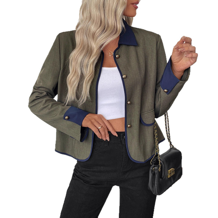 Ladies short blazer with contrasting piping, lapel collar and decorative buttons Mune Fashion