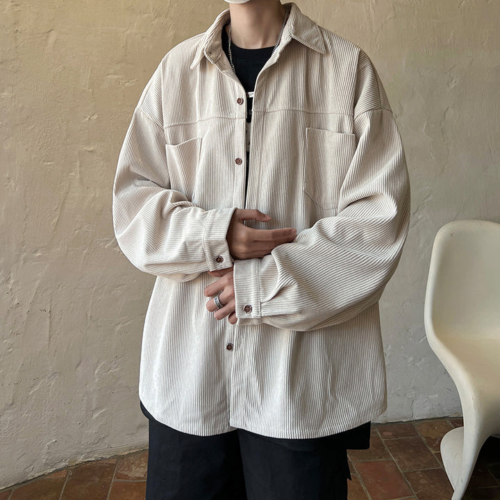 Men's oversized cord shirt jacket with stitched breast pockets, rounded hem, and loose silhouette Mune Fashion