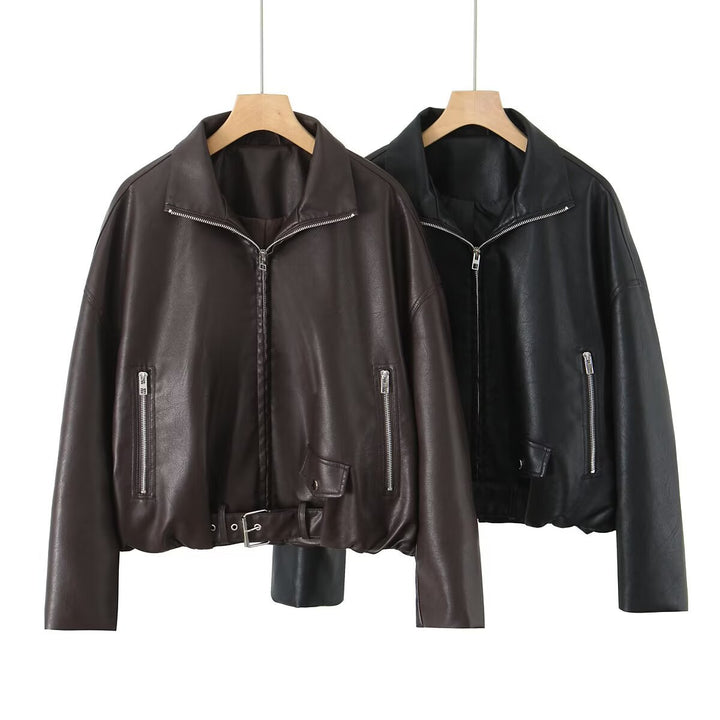 Women’s cropped oversized leather jacket in bomber style with zippered pockets and waist belt Mune Fashion