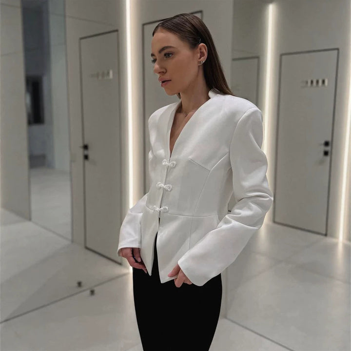 Women's peplum blazer with mandarin-like neckline and decorative knot fastenings Mune Fashion