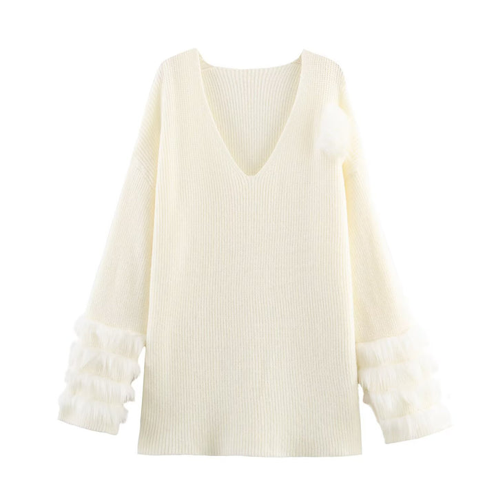 Ladies fine knit mini dress with deep V-neckline and layered faux fur sleeves Mune Fashion