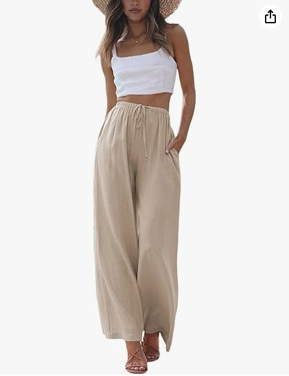 Women's wide linen pants with elastic waistband, drawstring, and side pockets Mune Fashion