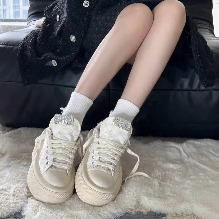Women's sneakers with glittering appliqués and raised platform Mune Fashion
