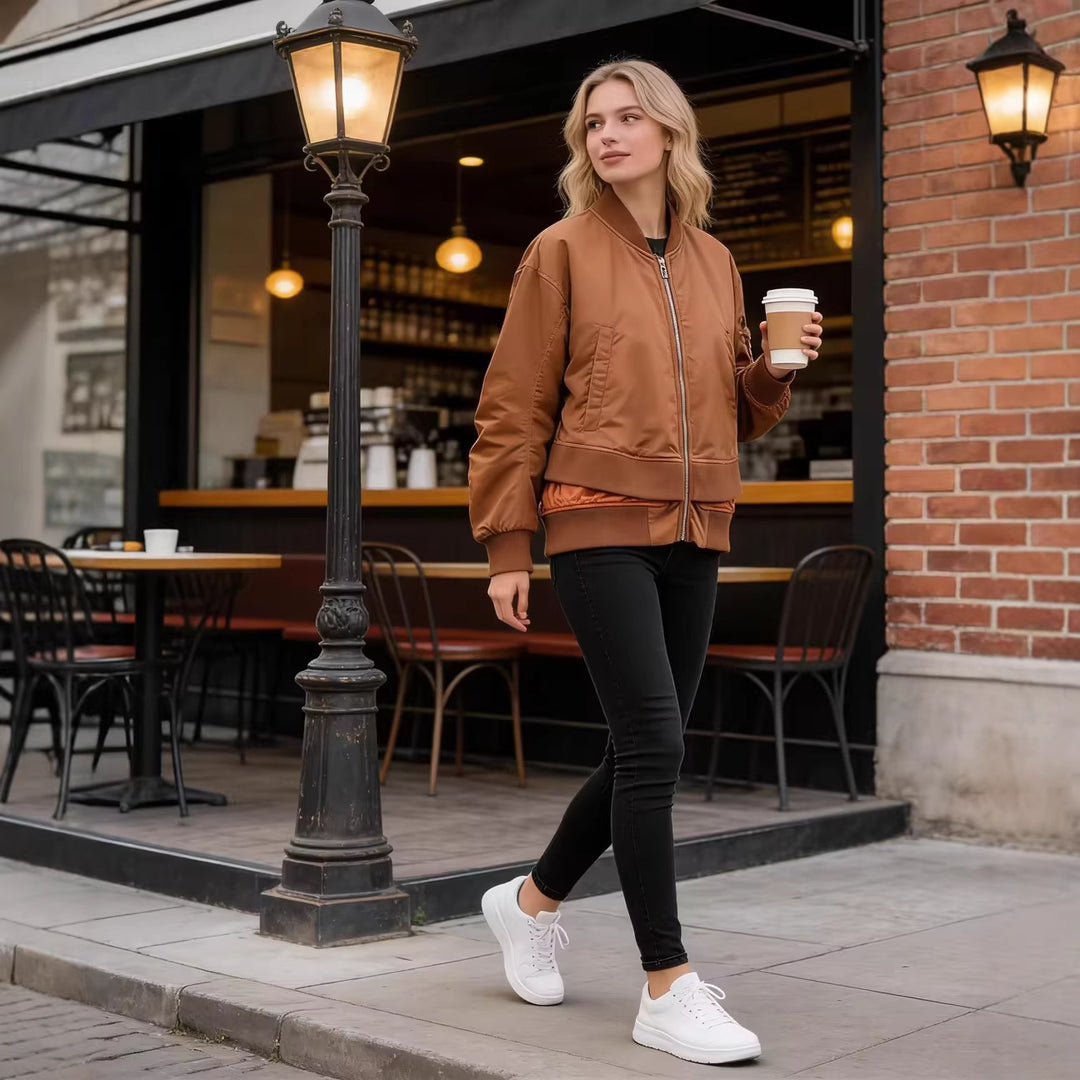 Women's Oversize Bomber Jacket with padded quilted lining, sleeve zip pocket and wide ribbed cuff Mune Fashion