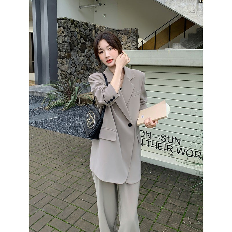 Women's Oversize two-piece made of flowing crepe with lapel blazer and wide pleated trousers Mune Fashion