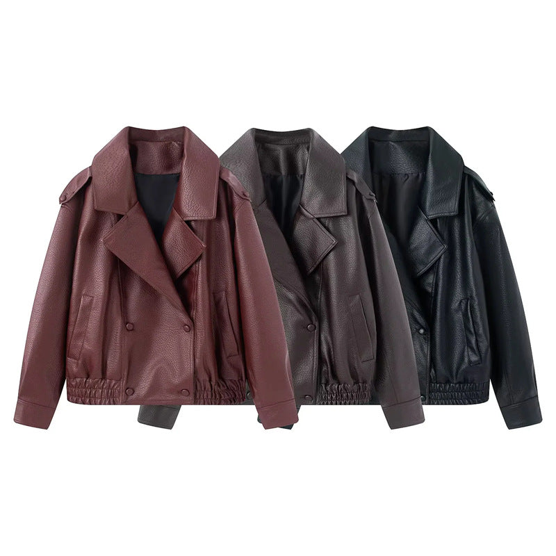 Women's short oversized faux leather blouson with shawl collar, snap button double row and elastic hem Mune Fashion