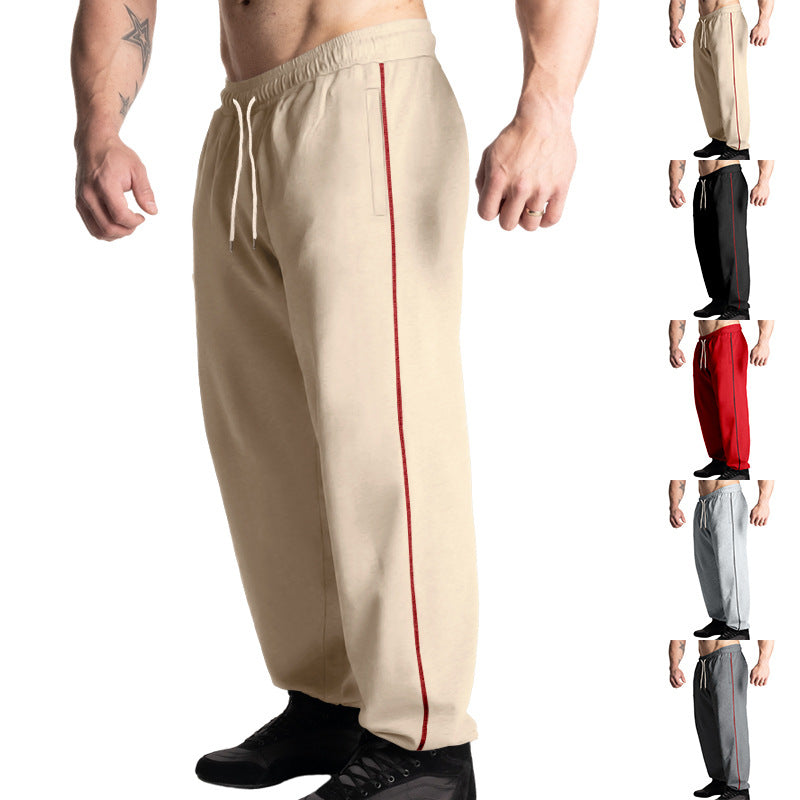 Men's casual jogging pants with elastic drawstring waistband, subtle side stripe, and deep side pockets Mune Fashion