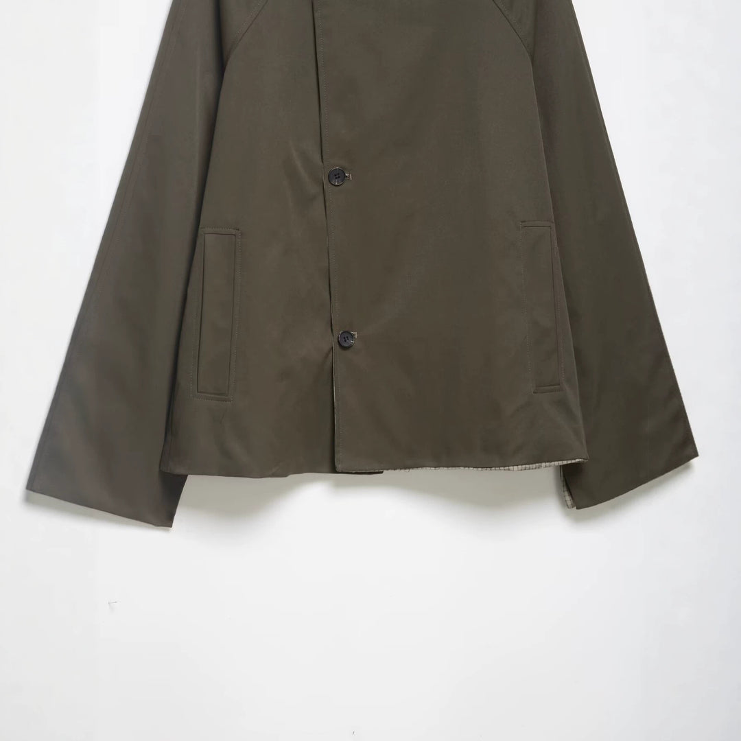 Men's short water-repellent transitional jacket with high stand-up collar, asymmetrical button placket, and raglan sleeves Mune Fashion