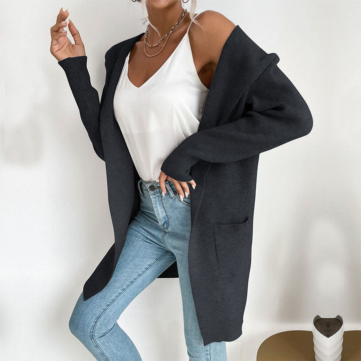 Women's longer ribbed cocoon cardigan made of lightweight fine knit with patch pockets Mune Fashion