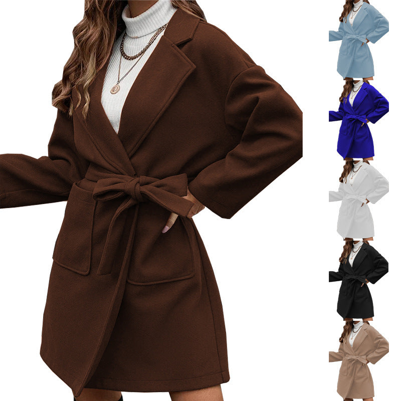 Ladies wrap coat with tie belt, large flap pocket and lapel collar Mune Fashion
