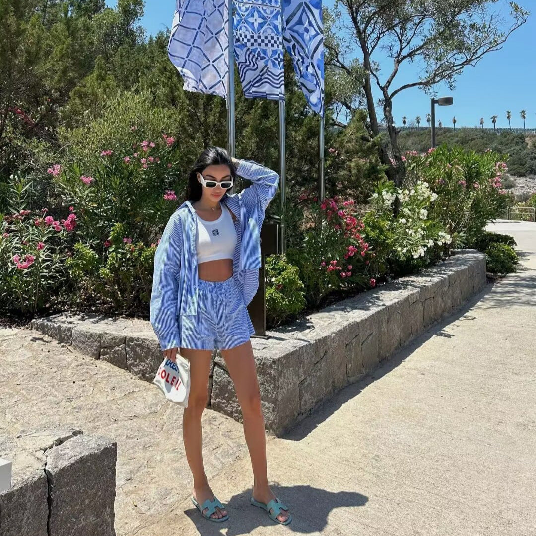 Women's oversized shirt dress made of lightweight cotton blend with extended back hem and open button placket Mune Fashion