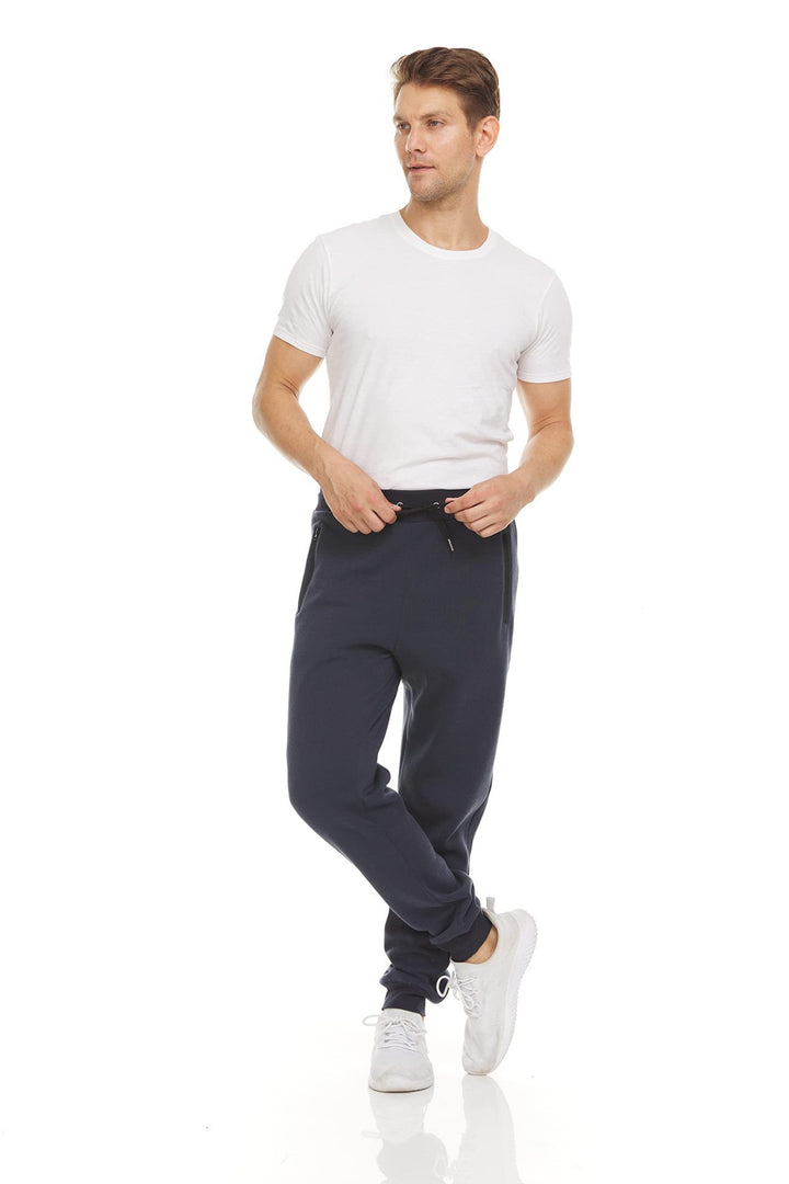 Women nan tailored jogger pants with side zip pockets, drawstring and tapered leg cuffs Mune Fashion