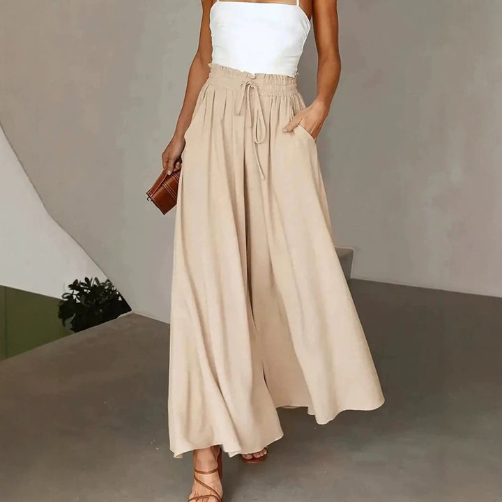 Women's flowing Palazzo pants with paperbag waist and deep side pockets Mune Fashion