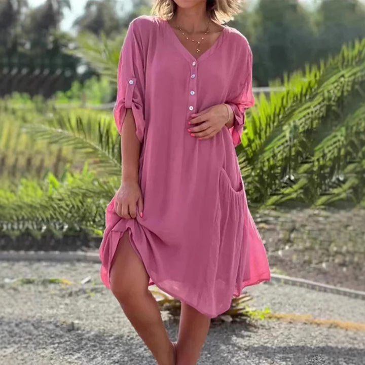 Ladies light V-neck tunic dress with button placket, patch pocket and roll-up sleeves Mune Fashion