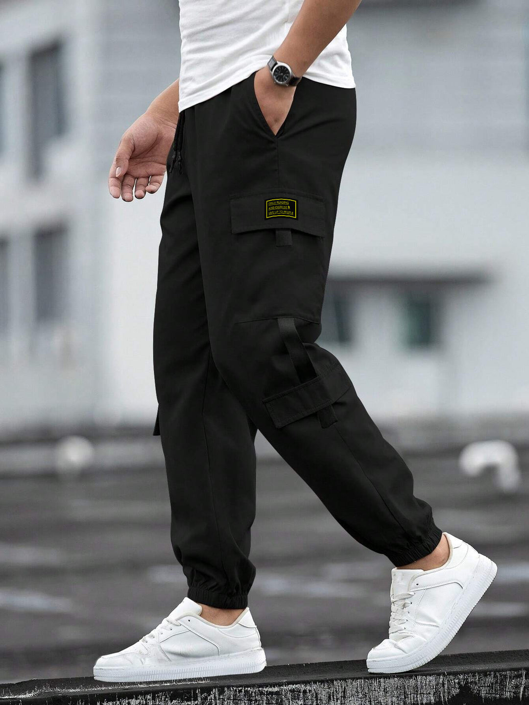 Men's fashionable cargo jogger pants with elastic waistband, drawstring, and multiple security and flap pockets Mune Fashion