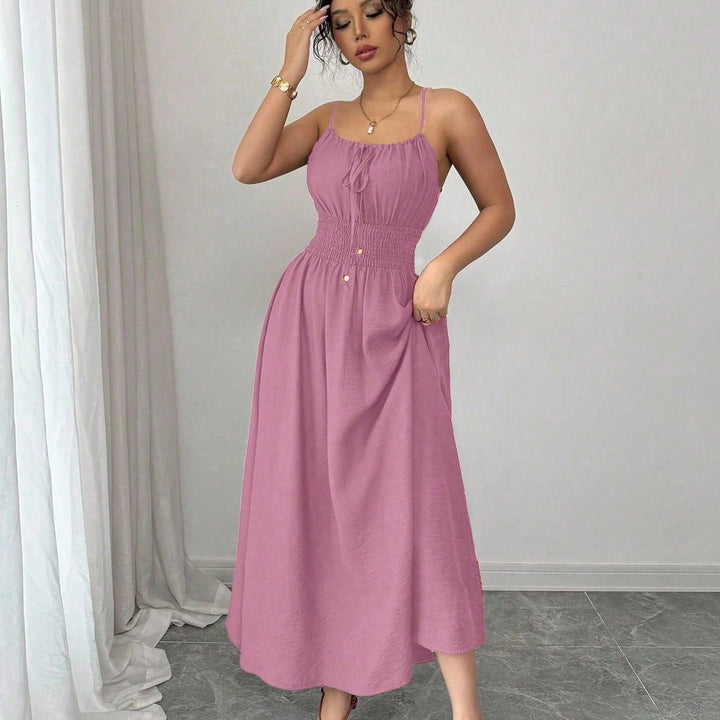 Women’s midi dress with smocked waistband, spaghetti straps, and tie cord Mune Fashion
