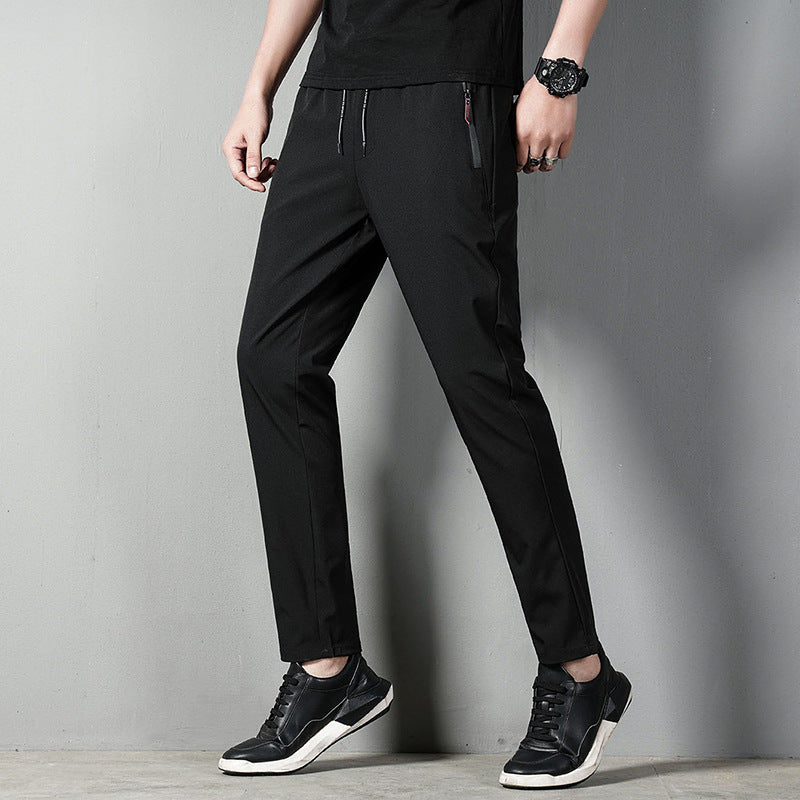Men's narrow-fitting tech chino joggers with elastic drawstring waistband, concealed zip pockets, and pre-shaped knees Mune Fashion