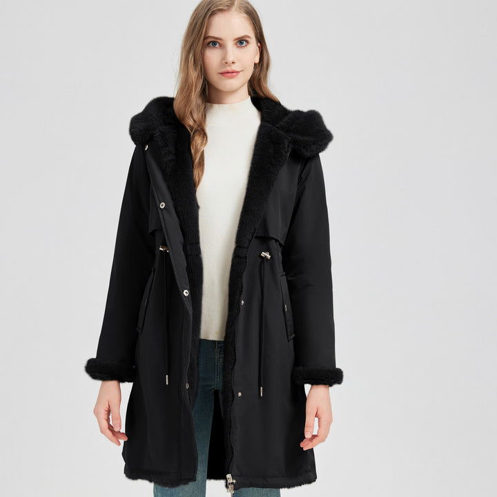 Women's tailored long thermal parka with faux fur trim on hood and sleeves as well as drawstring waist Mune Fashion