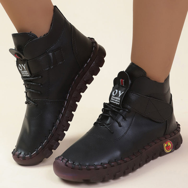 Women ankle-high comfort lace-up booties with Velcro closure and textured rubber outsole Mune Fashion