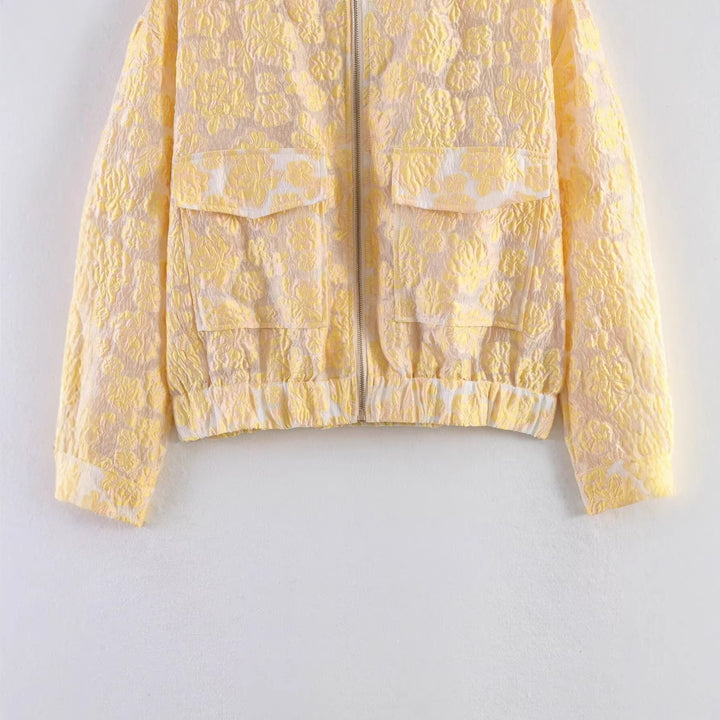 Women's quilted bomber jacket with floral jacquard, zipper and flap pockets Mune Fashion