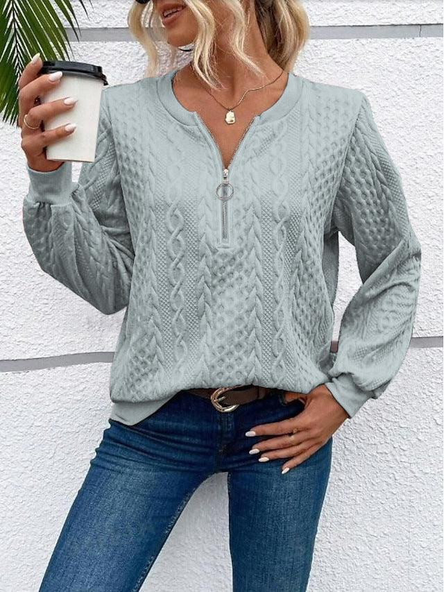 Women's coarsely structured knitted pullover with cable knit pattern, half zip and balloon sleeves Mune Fashion