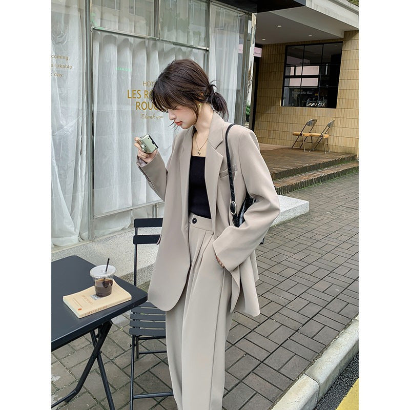 Women's Oversize two-piece made of flowing crepe with lapel blazer and wide pleated trousers Mune Fashion