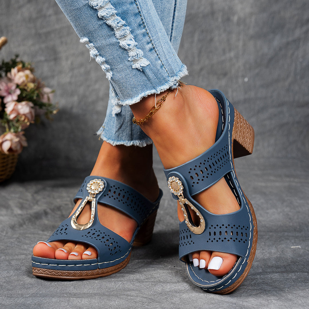 Ladies sandals with block heel, perforated upper material and decorative application Mune Fashion