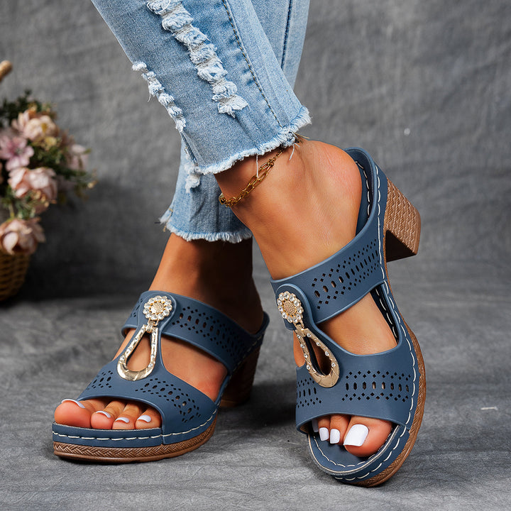 Ladies sandals with block heel, perforated upper material and decorative application Mune Fashion