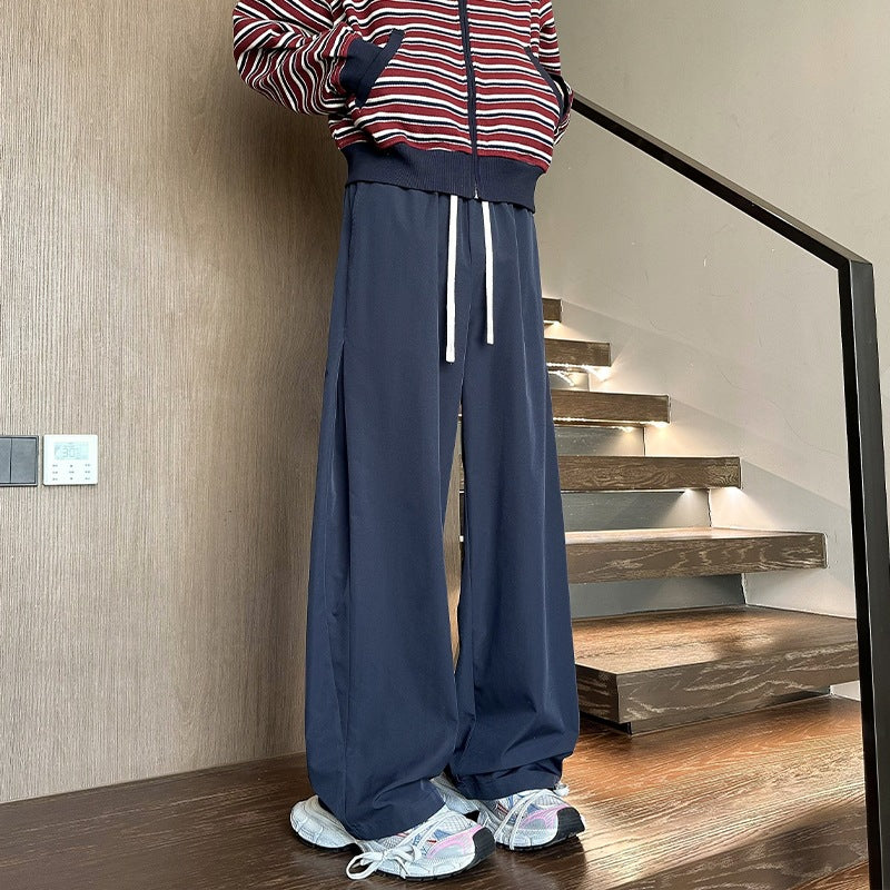 Women's wide-cut lounge pants with high elastic waistband and drawstring Mune Fashion