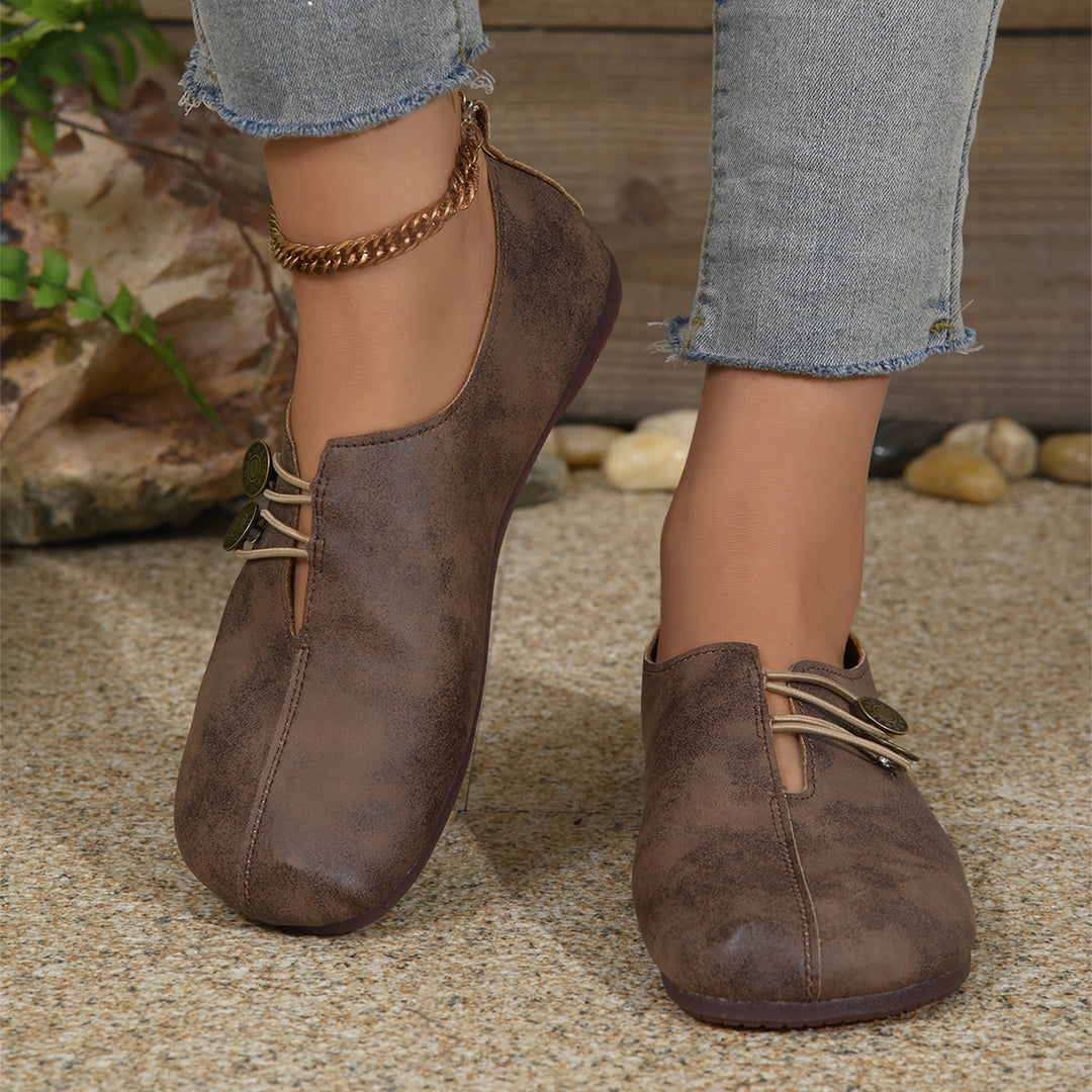 Women's cozy leather-look slip-ons with elastic decorative cord and square toe area Mune Fashion