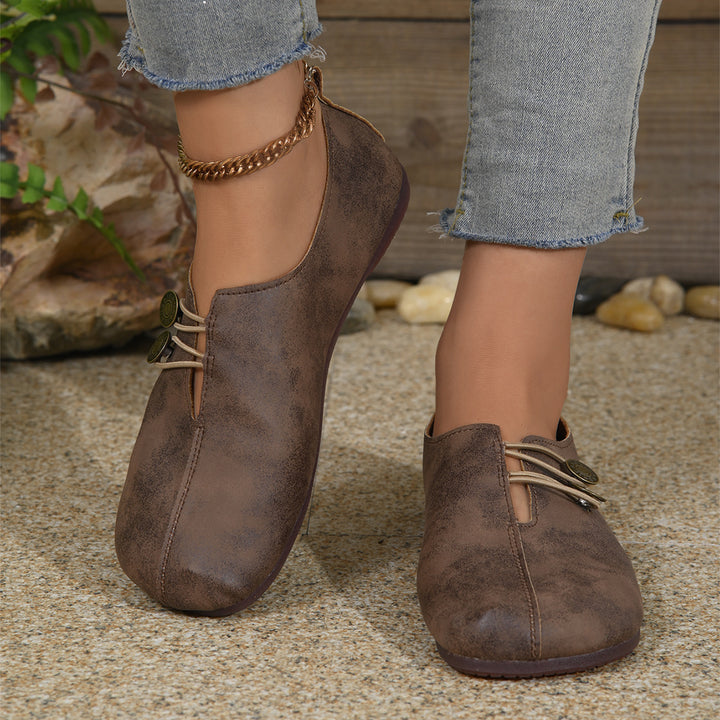 Women's cozy leather-look slip-ons with elastic decorative cord and square toe area Mune Fashion