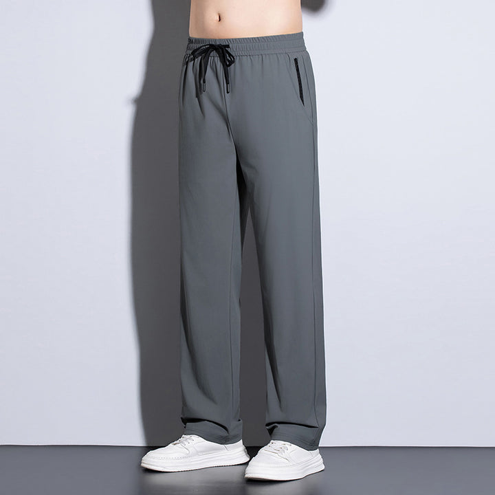 Men's sporty training pants with elastic waistband and practical pockets Mune Fashion