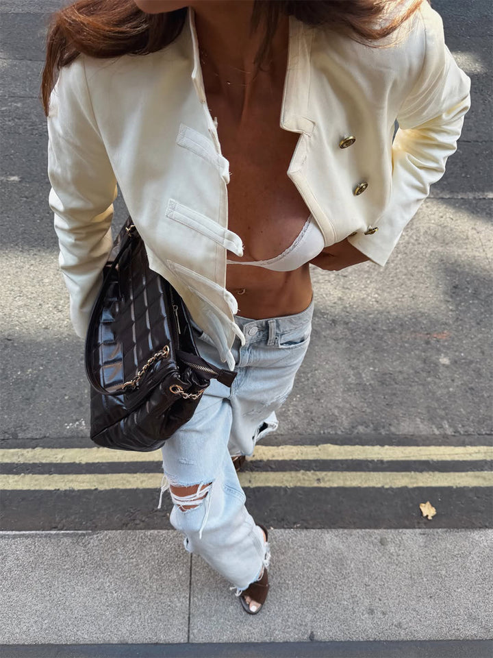 Women's short blazer with short cropped cut, stand-up collar and decorative hook closures Mune Fashion