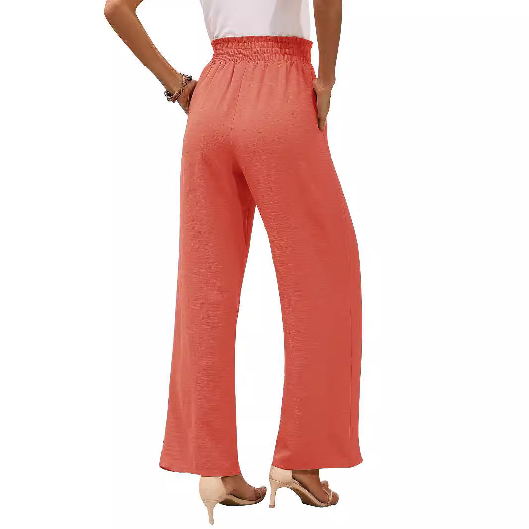 Women's paperbag trousers with wide leg, high elastic waistband and tie belt Mune Fashion
