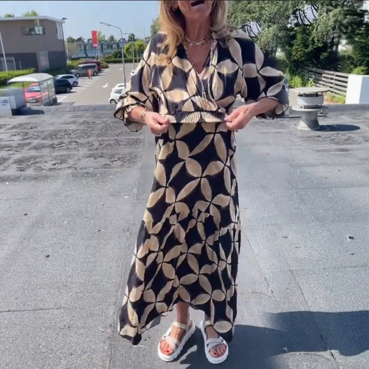 Women's maxi dress with geometric all-over print, smocked waist and ruffled tiers Mune Fashion