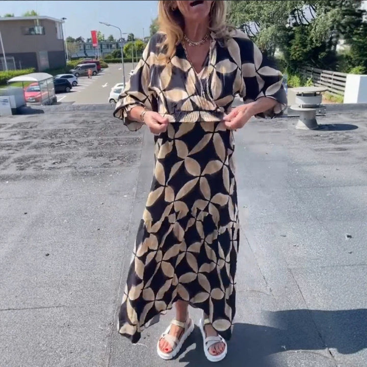 Women's maxi dress with geometric all-over print, smocked waist and ruffled tiers Mune Fashion