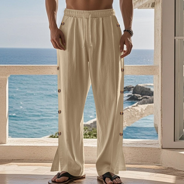Men's wide beach pants with side snap-button opening, elastic drawstring, and airy linen blend Mune Fashion