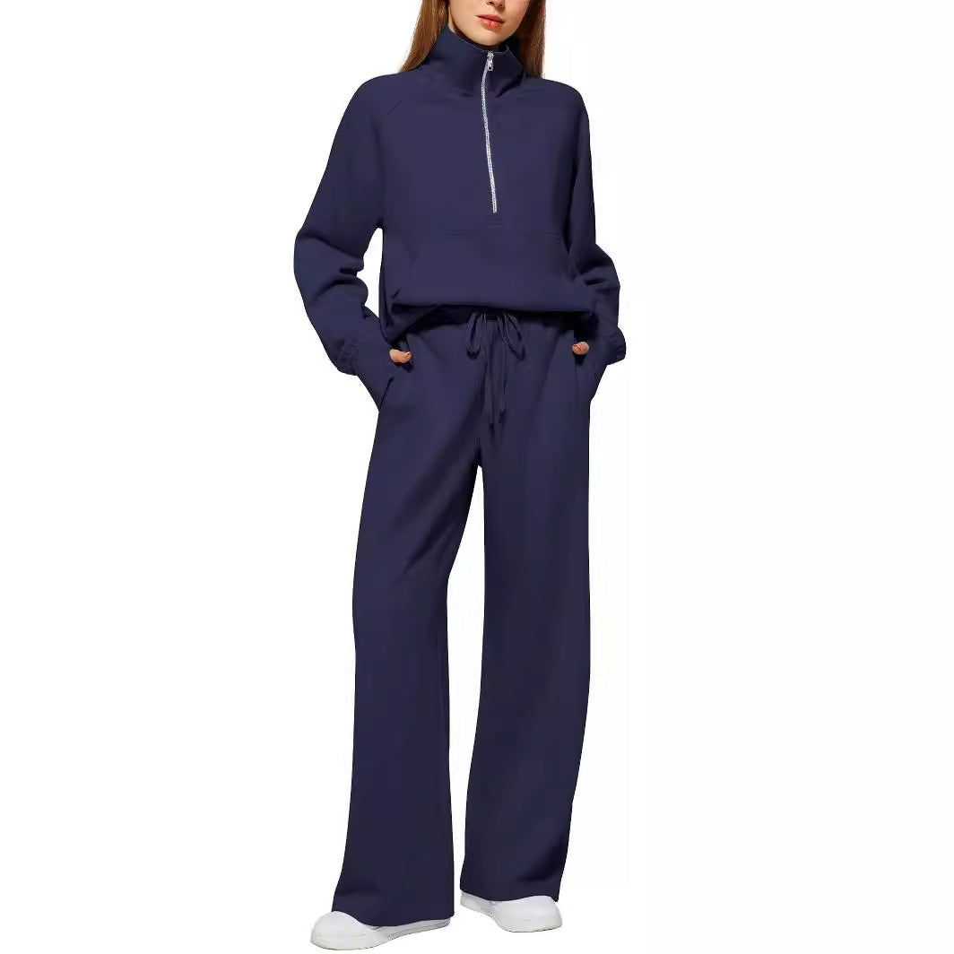 Women half-zip lounge set with high stand-up collar, kangaroo pocket and wide high-waist joggers Mune Fashion
