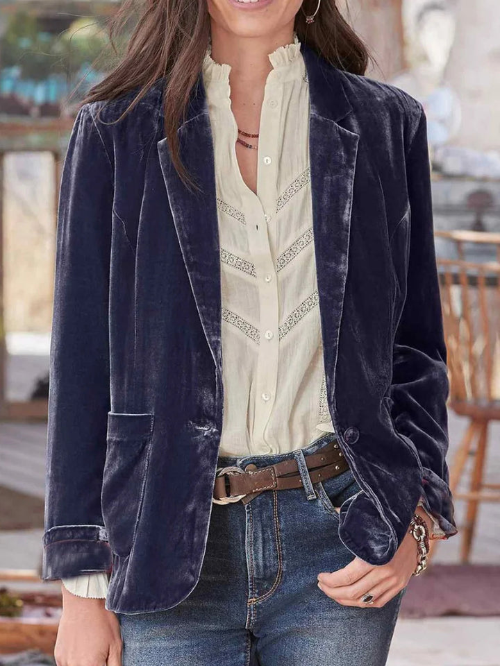 Women's velvet blazer with classic lapels and soft drape